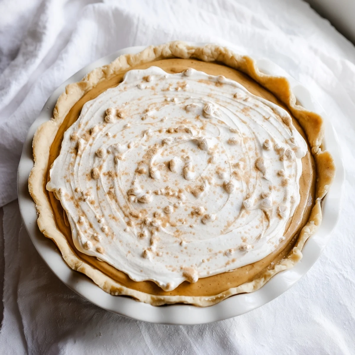 A slice of Soft Golden Home Plate, showing saffron and vanilla custard's creamy texture.