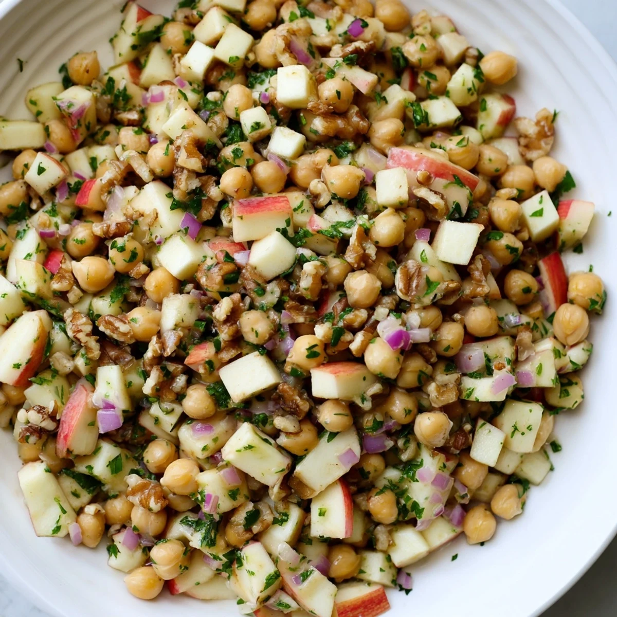 Vibrant Fall Harvest Apple and Chickpea Salad: a close-up of the delicious, gluten-free vegetarian salad.