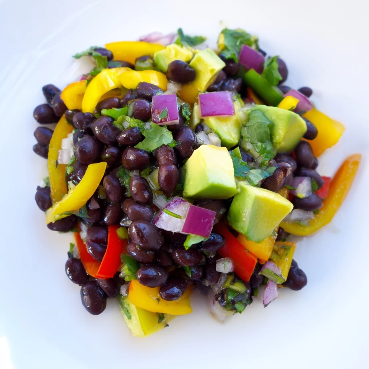 Close-up of a refreshing Southwest Black Bean Salad, showcasing the bright colors and textures.