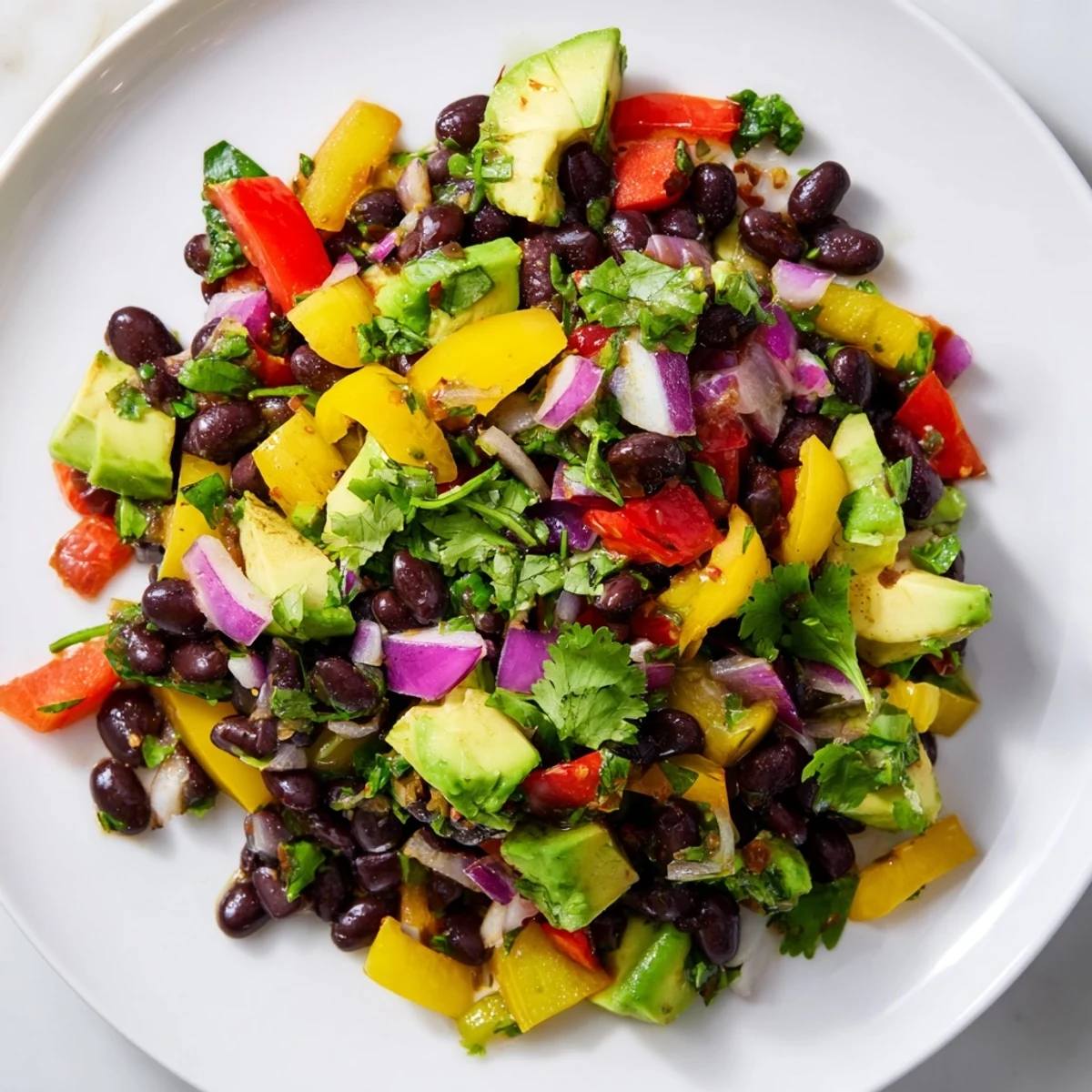 Vibrant Southwest Black Bean Salad with colorful bell peppers, corn, and a zesty lime dressing.