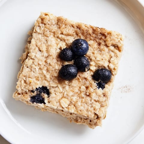 Warm, rich, and hearty Protein Pancake Oats, perfect for a high-protein, satisfying breakfast treat.