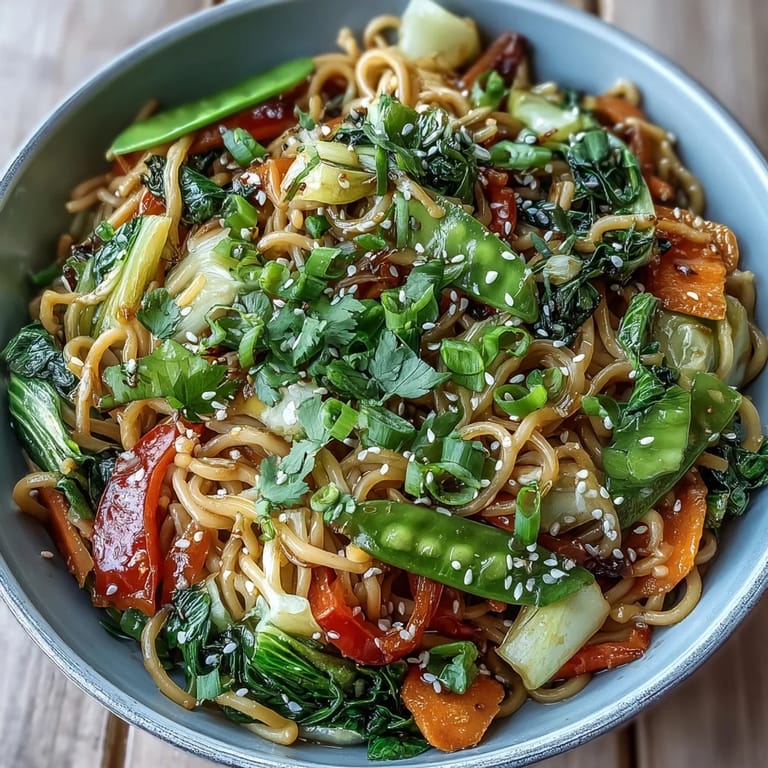 Quick Asian fusion Shirataki Noodle Bowl featuring julienned carrots and green onions, tossed in a fragrant ginger sauce.